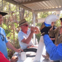 Installing the water piping on the tank.